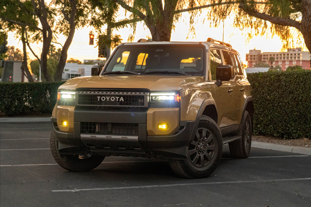 2026 Toyota Land Cruiser Front 3/4 View With Sunset in Background in Parking Lot in Southern California