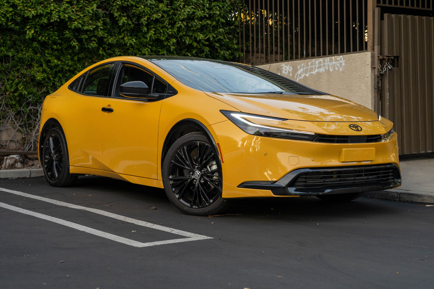 2026 Toyota Prius Plug-In Hybrid XSE Nightshade Edition in yellow front 3/4 view